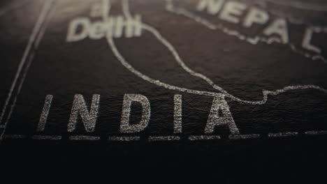 close-up of an antique map detailing india and surrounding regions