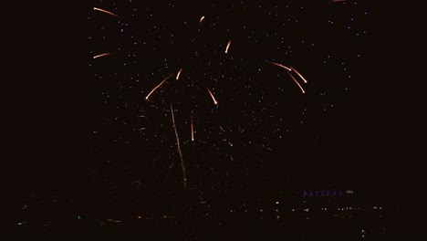4k.beautiful colourful fireworks shiny display at night loop background, glowing fireworks show, new year's eve fireworks celebration