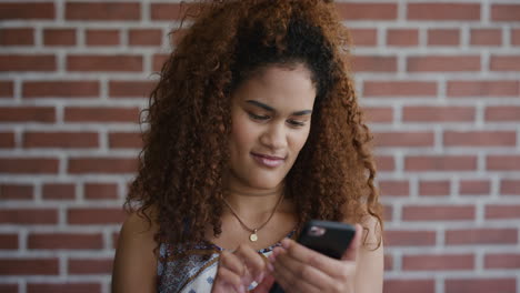 portrait-beautiful-young-mixed-race-woman-using-smartphone-enjoying-browsing-online-messages-sending-sms-on-mobile-phone-app-digital-communication-experience-slow-motion