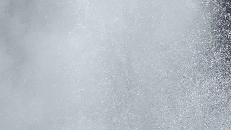 slow motion close up of a geyser erupting in yellowstone national park