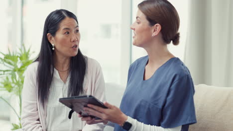 Tablet,-consulting-or-nurse-talking-to-woman