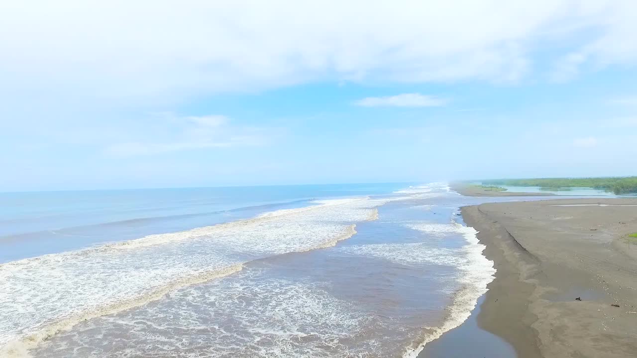 Beautiful sunny day in the beach with a blue sky.