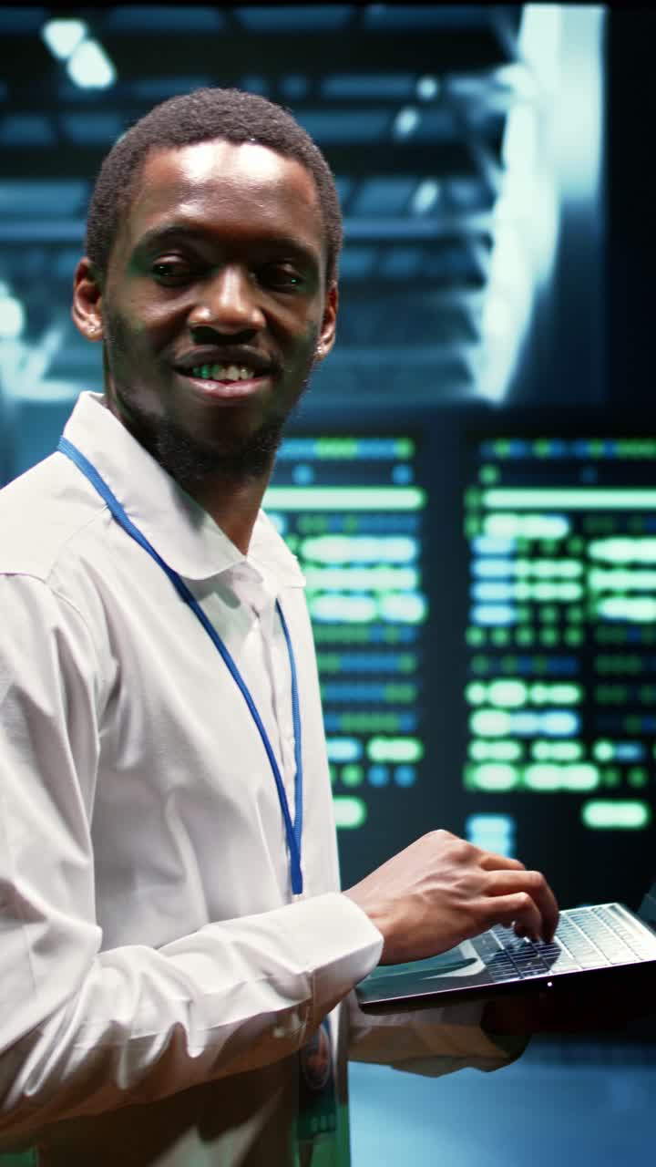 Vertical video Engineer inspecting server network