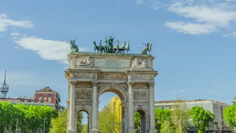 arch of peace with statues on top built in park of milan