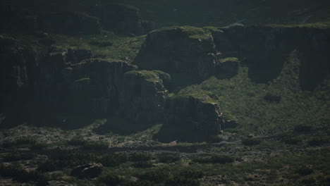 dramatic mountain landscape with a stream