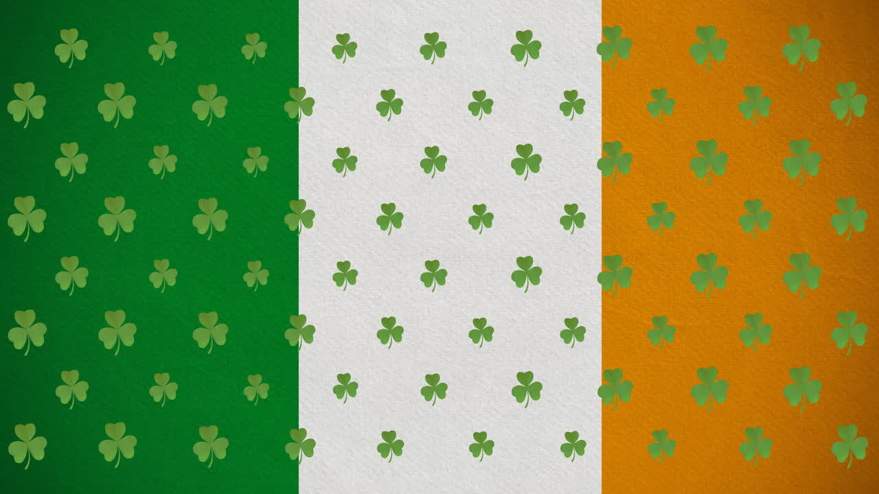 Animazione digitale di molteplici foglie di trifoglio che si muovono contro la bandiera irlandese.