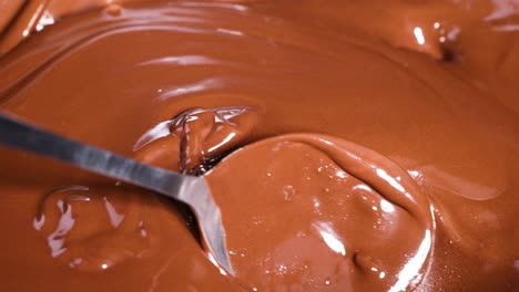 smooth chocolate being stirred and poured