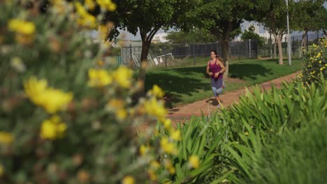 caucasian woman running in a park