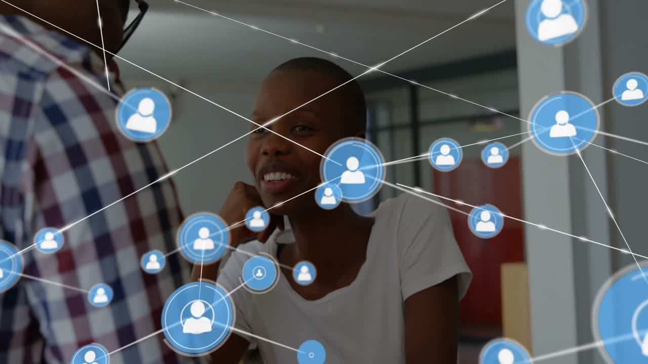 Animation of network of connections with icons over diverse business people in office
