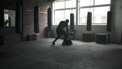 Gym,-start-and-a-man-with-a-bag-for-exercise