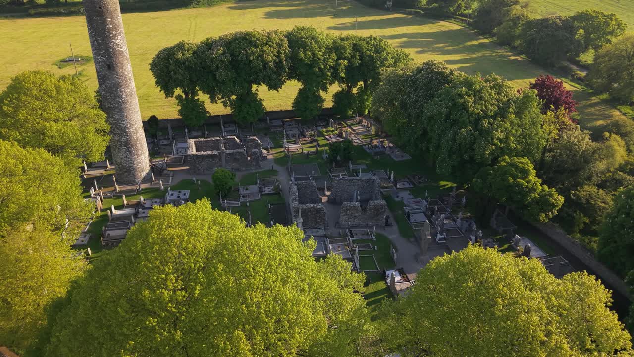 Monasterboice Round Tower In County Louth in Ireland. - aerial shot