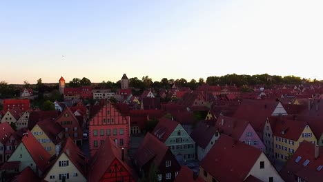 summer sunset aerial view over the roofs of the houses of the old town beautiful colors