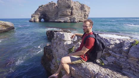 Young-man-watching-the-ocean.