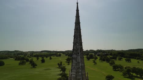 the marble church, bodelwyddan, wales - neo-gothic aerial drone anti-clockwise pan, focus in close on spire, move out and reveal church - june 23