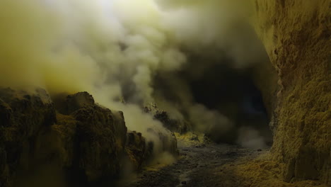 volcanic cave interior with smoke and steam