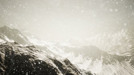 heavy snowing, focused on the snowflakes, mountains in the background