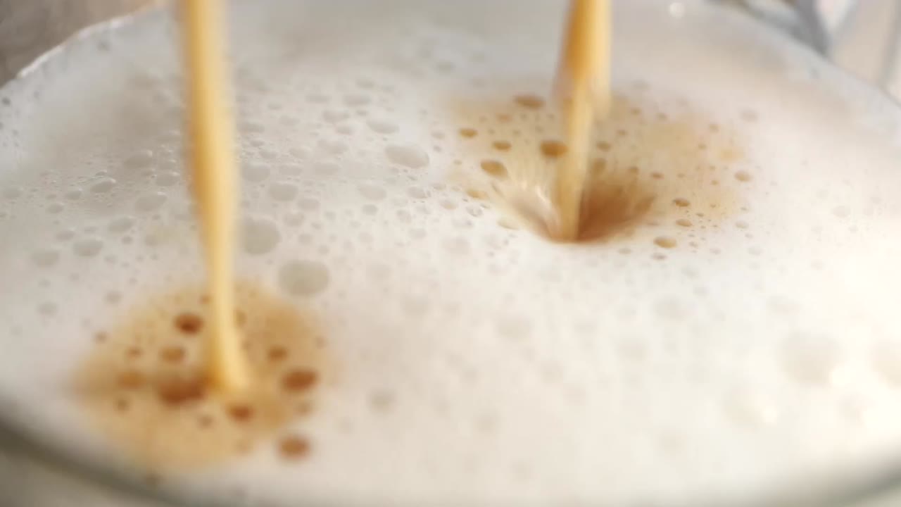 Pouring coffee into foam