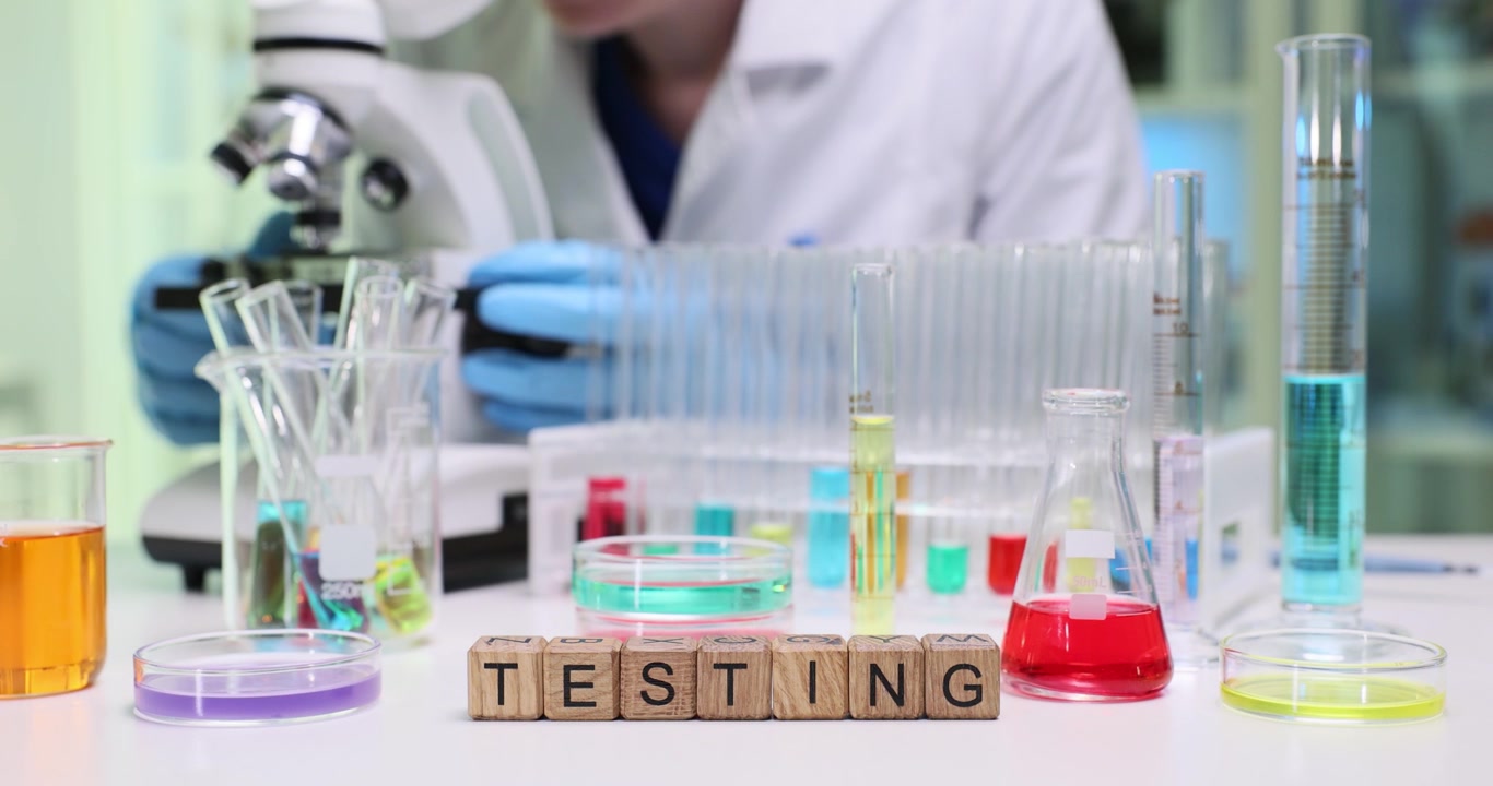 Conducting lab tests with microscopes and colorful chemicals for analysis and research