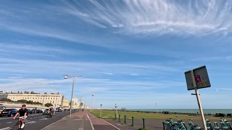 cyclist riding along brighton seafront path