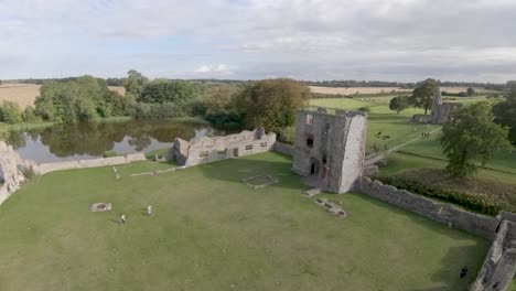 Aerial-Drone-Footage-of-the-ruins-of-Baconsthorpe-Old-Manor,-North-Norfolk