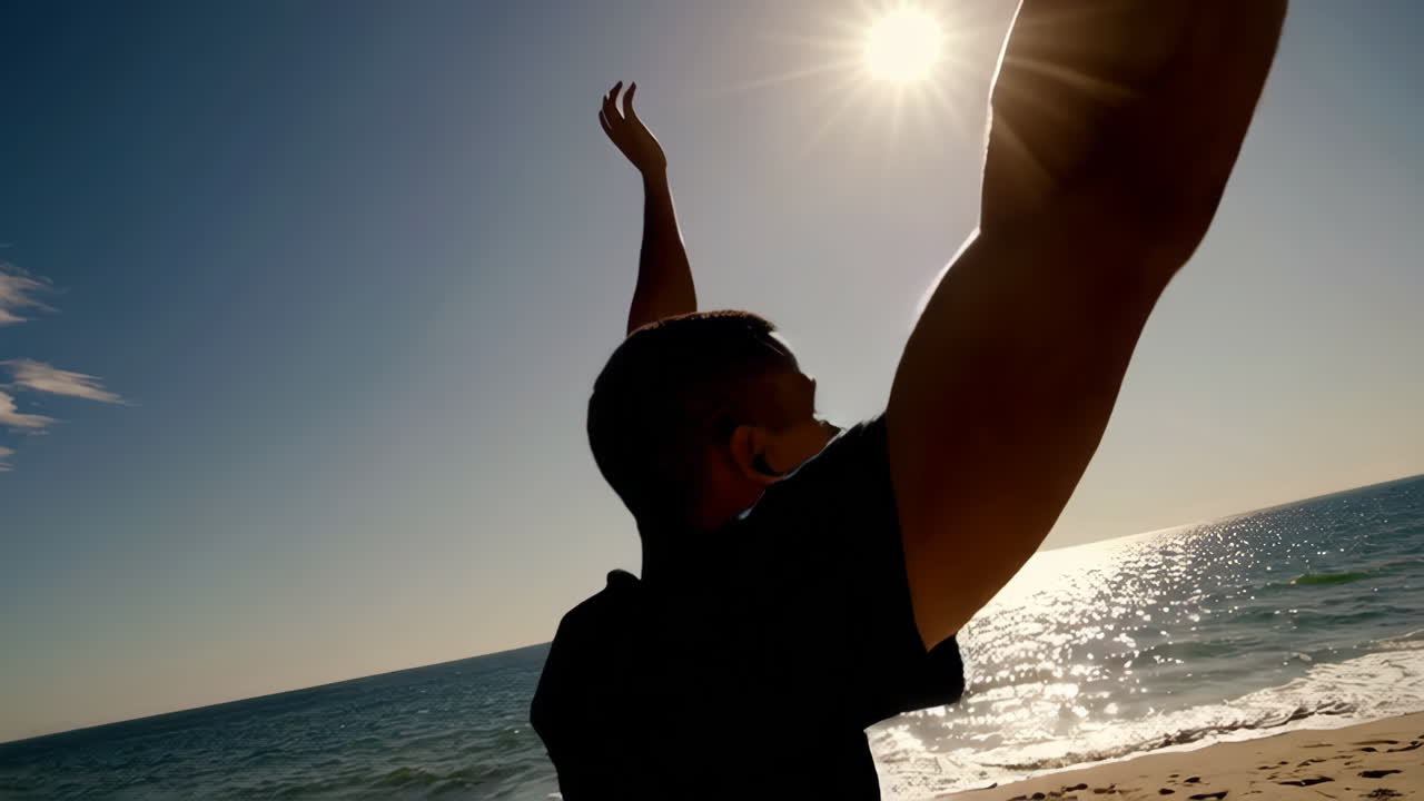 Silhouette of a person on a beach