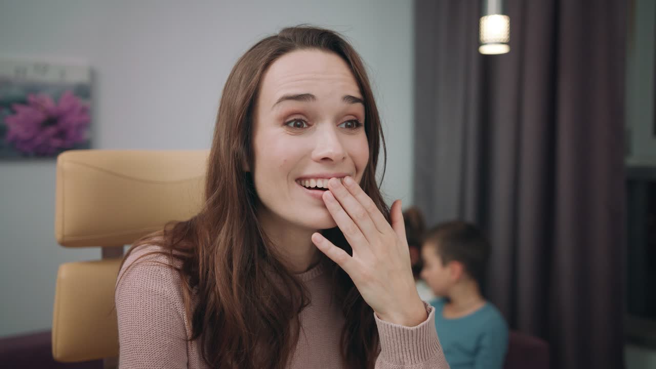 Surprised mother face. Portrait of happy woman enjoy good news at computer