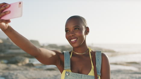 black woman, phone selfie and happy on beach