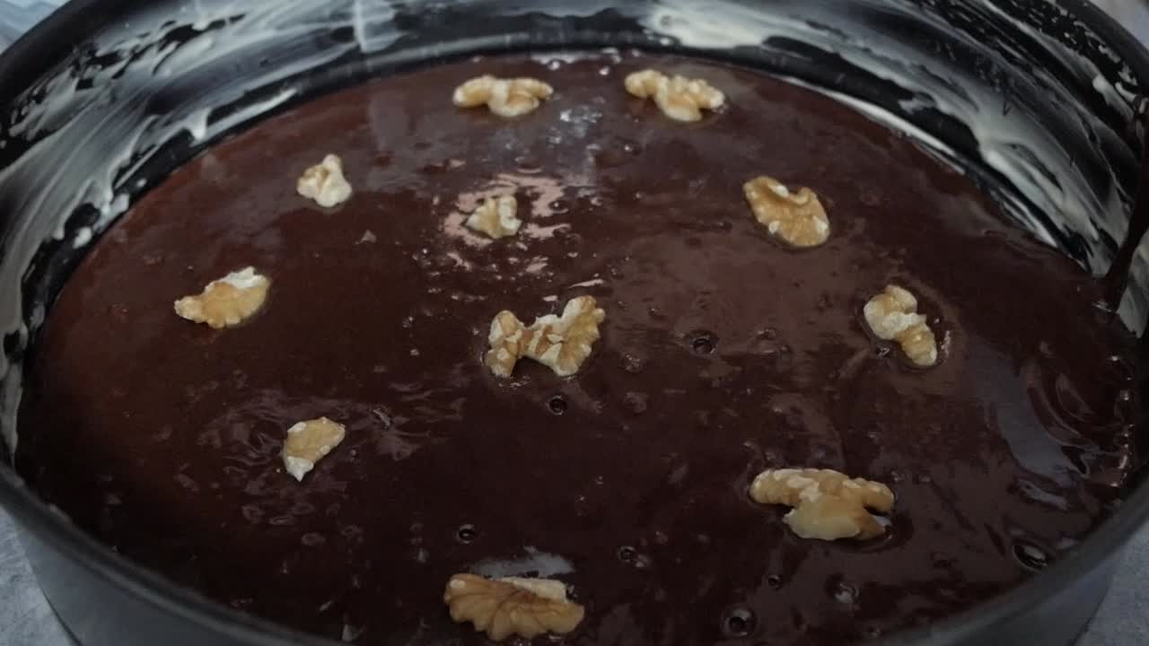 Topping chocolate cake mix with walnuts