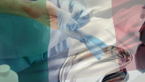animation of flag of italy waving over surgeon in operating theatre