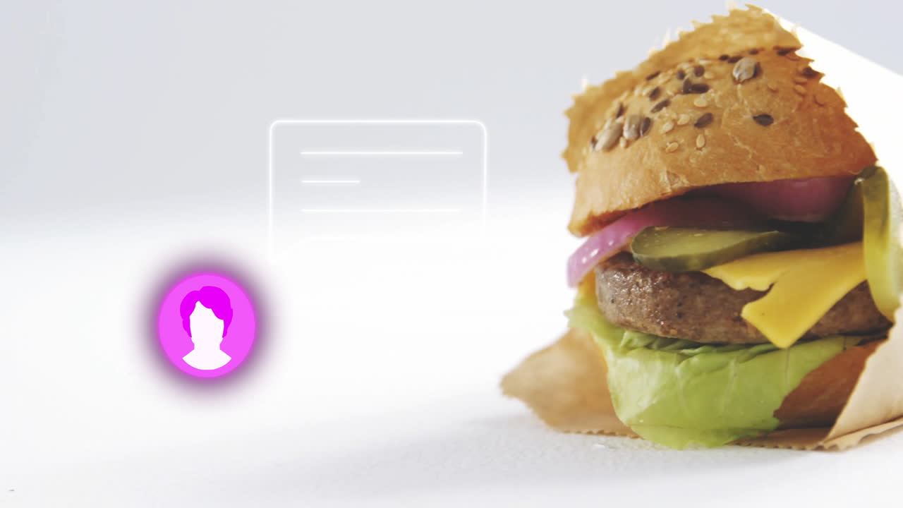 Burger with lettuce and cheese next to glowing profile icon animation