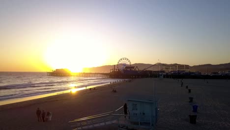 sunset over a lifeguard tower