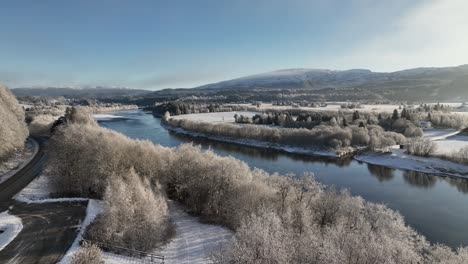 Drone-Aerial-Shot-Flying-Over-snowy-landscape-in-Norway