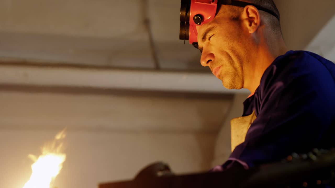 Welder welding a metal