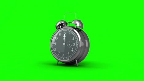 Alarm-clock-ringing-on-green-background