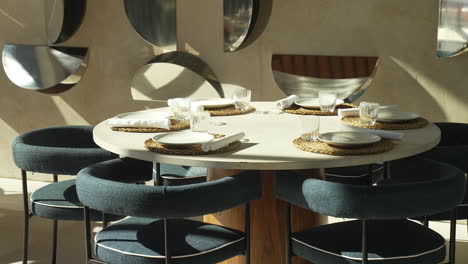 restaurant table for lunch on a sunny day, creating a sophisticated dining experience in the bright ambiance