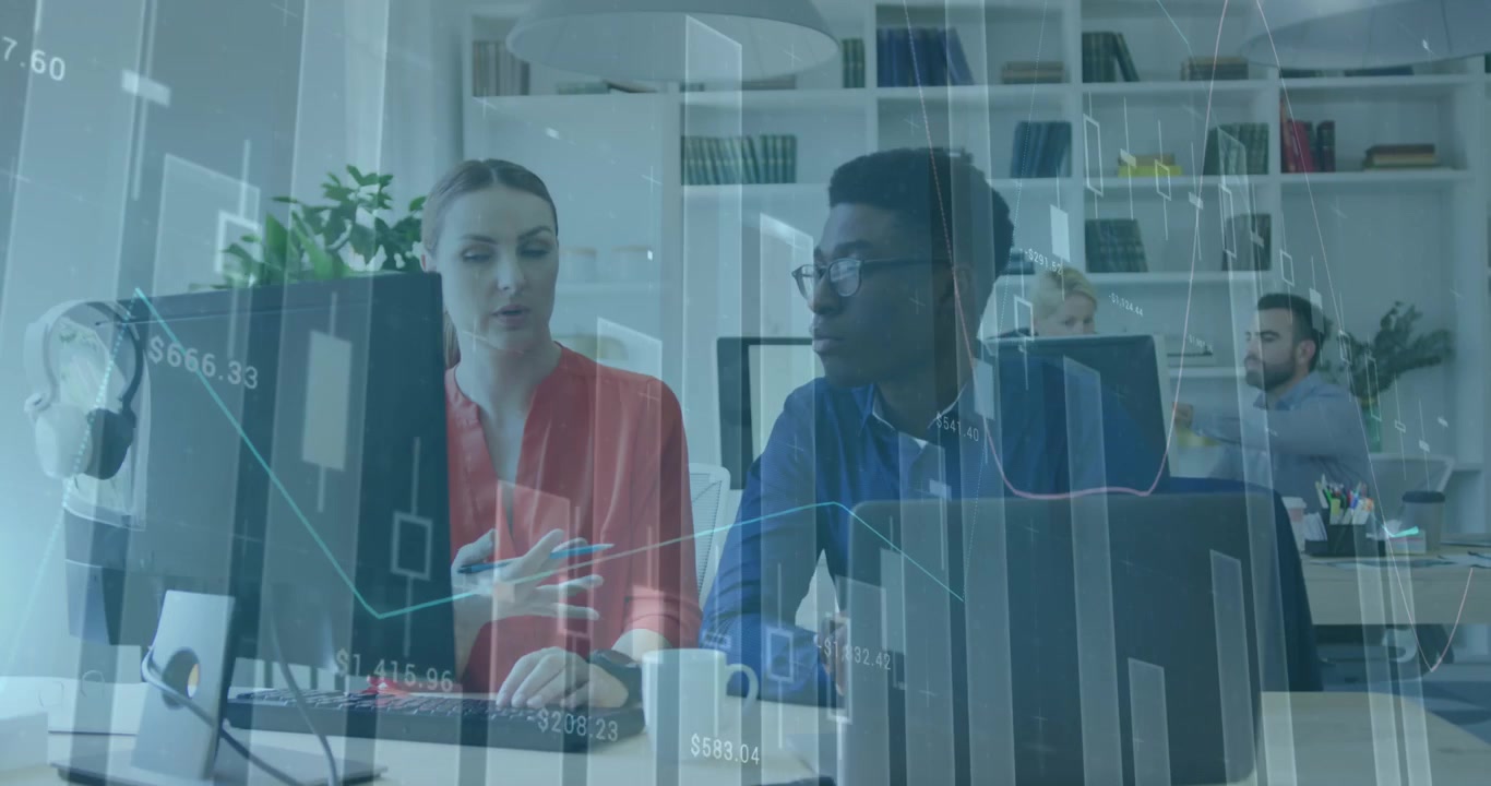 Colleagues Collaborating on Financial Data Analysis in Modern Office