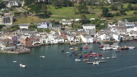 aerial view of boats moored in fowey harbour, on the river fowey in cornwall, uk