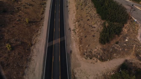 Drone-shot-of-cars-traveling-down-road-near-Little-Cottonwood-Canyon