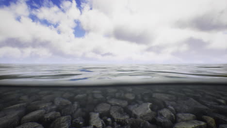 beneath surface smooth pebbles rest on the ocean floor