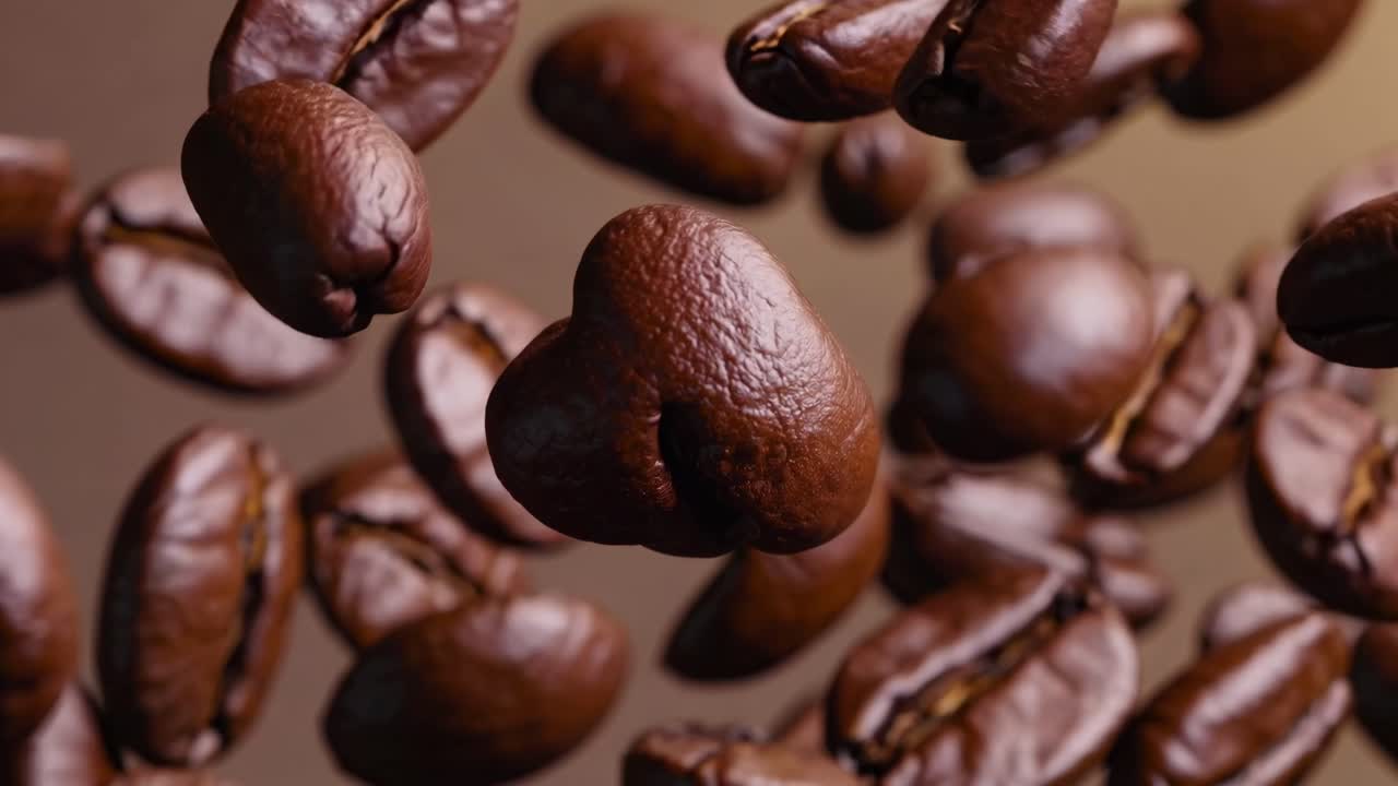 Close-up video of coffee beans in mid-air, captured with a macro lens