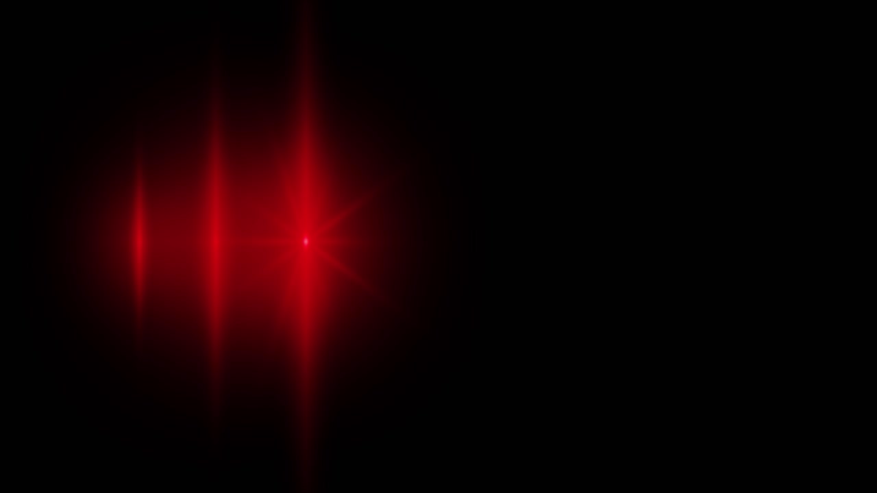 Red and blue emergency flashing lights police beacon on a black background light leaks pulsing and