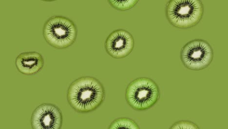 falling kiwis abstract background. 4k continuous loop. season feast. summer fruit concept.