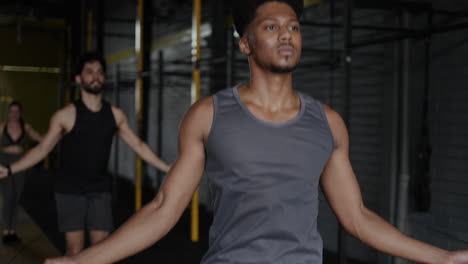 man jumping rope in gym