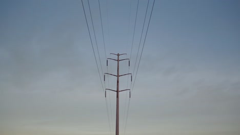 a loan telephone wire at sunset in colorado