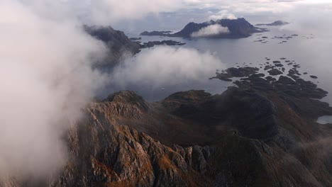 Aerial-view-of-Segla-mountain-above-the-sky,-Norway-during-summer