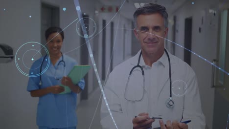 Animation-of-data-processing-over-diverse-doctors-smiling