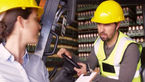 workers interacting with each other in factory