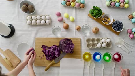 Top-view-video-of-dyeing-Easter-eggs-on-the-table