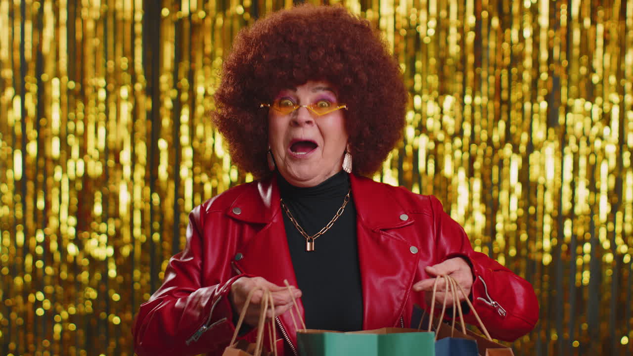 Happy tourist woman showing shopping bags, advertising holidays discounts, amazed with low prices