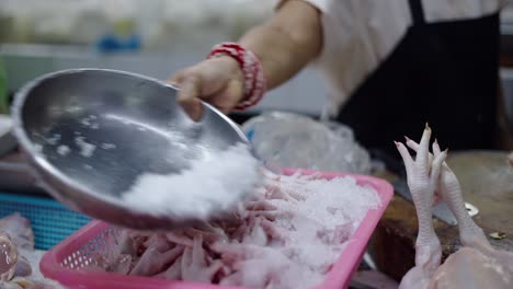 fresh chicken feet at a market
